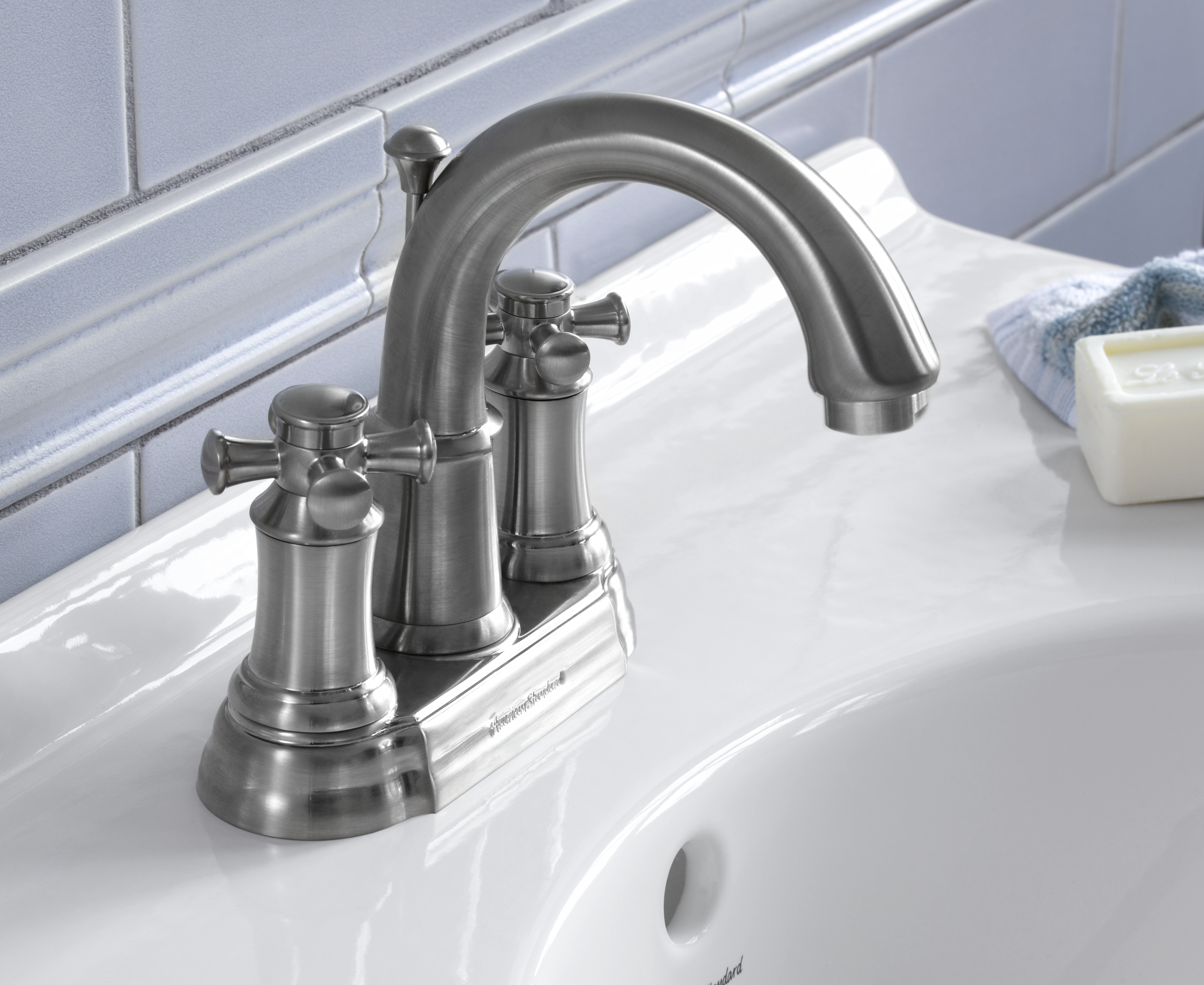 Portsmouth 4-In. Centerset 2-Handle Crescent Spout Bathroom Faucet 1.2 GPM with Cross Handles